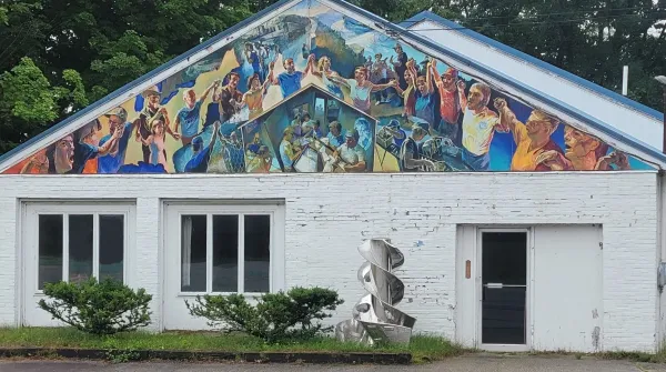 Front view Local 14 Solidarity Center union hall with mural and agitator